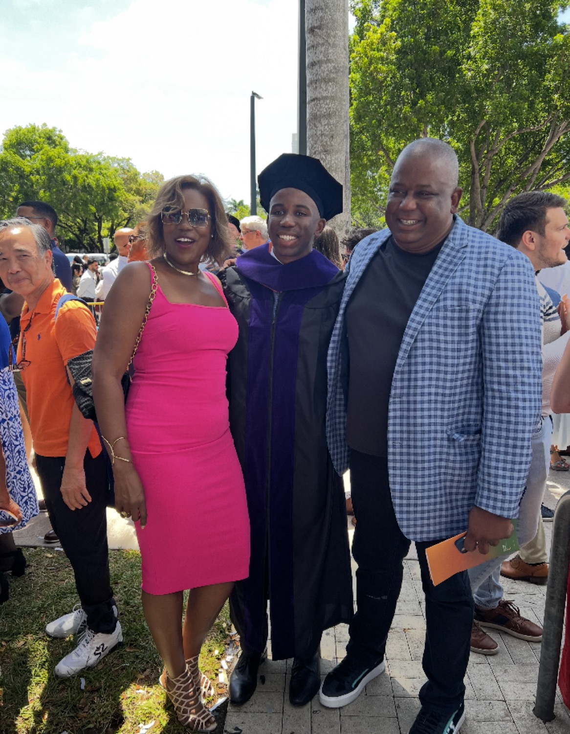 Kendrick Meek with his parents at his graduation